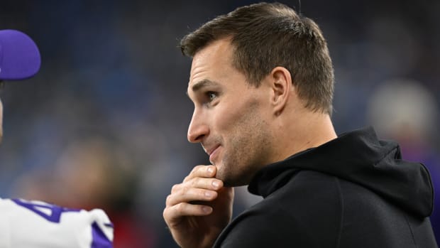 Kirk Cousins holds his hand up to
                                                                                 his chin